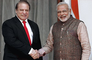 Modi, Sharif shake hands, meet at Saarc retreat