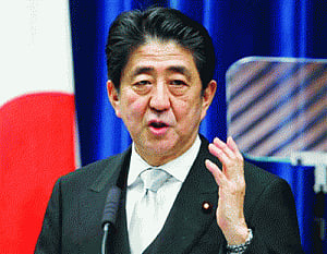 Japan factory output down, inflation slows in November