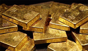 Gold futures drop Rs 51 on weak global cues