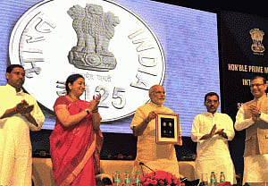 PM releases commemorative coins on Ambedkar