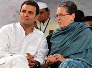 Modi targeting Opp, We won't bow down: Sonia and Rahul