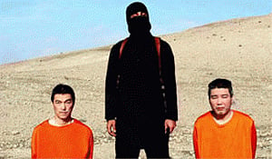 Japan vows to 'never give up' search for IS hostages