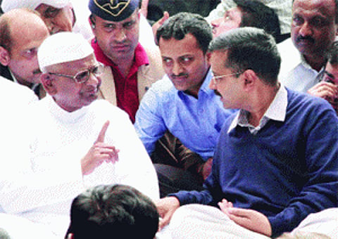Shishya Arvind invites 'Guru Anna' to bless his new office