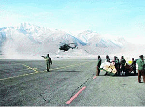 Forces blast holes in ominous lake to save Kargil