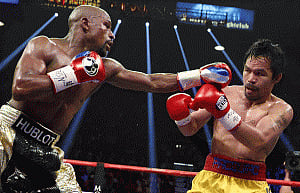 Mayweather beats Pacquiao to unify welterweight titles