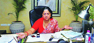Raje to weather the storm, won't resign