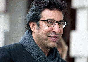 Akram escapes unhurt in gun attack on his car in Karachi