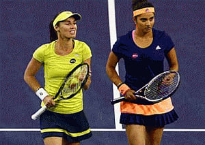 Sania-Hingis team ousted from Rogers Cup