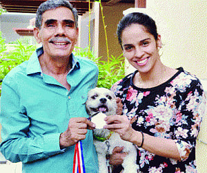 Saina dedicates silver to coach