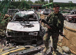 NATO says 3 foreigners among 10 killed by Afghan car bomb