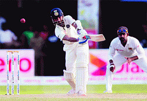 India seize the day after Mathews' ton
