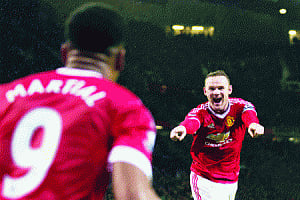 Rooney ends drought to give Van Gaal respite