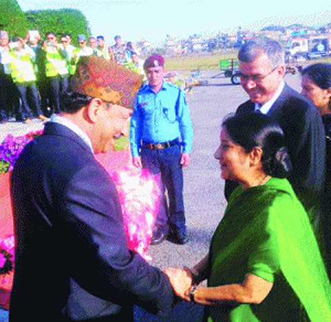 Sushma, Sartaj engage in 'social chitchat' at SAARC dinner