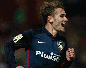 Atletico Madrid's Godin, Carrasco given medical clearance