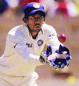 Not easy to fill Dhoni's void: Saha