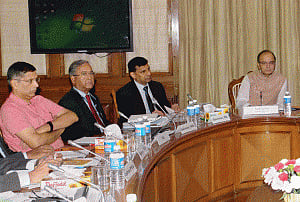 Show me how inflation is low: Rajan on 'dialogues' by critics