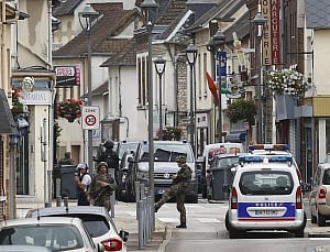 Priest's throat slit in French hostage drama
