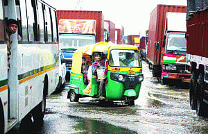 Rain wreaks havoc on city's roads