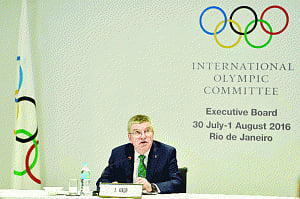 Bach defends IOC handling of Russia