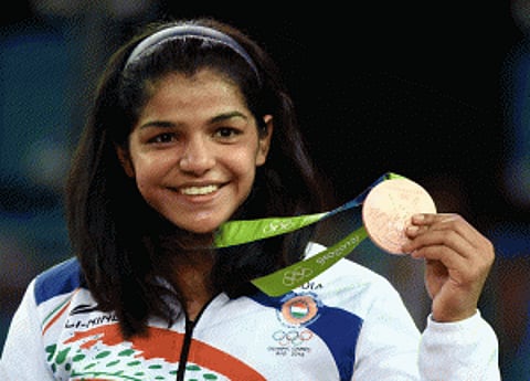 Sakshi breaks open medal chest with bronze on day 12
