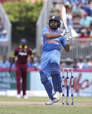 Rohit, Dhawan retained