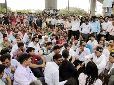 Protest against teacher's stabbing; Delhi Govt to give Rs 1-cr ex gratia