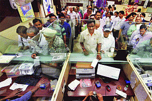 Trying cashless payday passes off peacefully