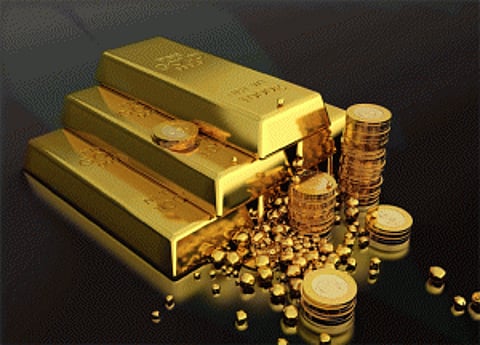 Gold weakens on global cues, muted demand