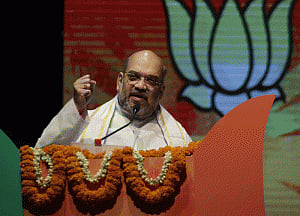 Meet BJP booth-level workers to know reason behind win:Shah to Kejriwal