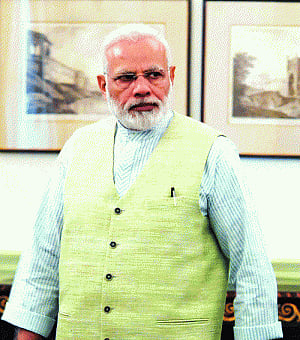 Happy that people evaluating my work in details, says Modi