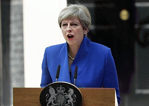 Britain's May reaches 'outline' power deal after election fiasco