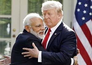 With hugs and praise, Modi and Trump strike rapport