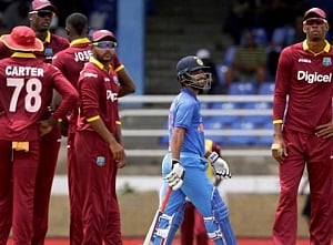 Slow batting sinks India, West Indies stay alive