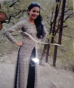Woman shot near Gzb police post