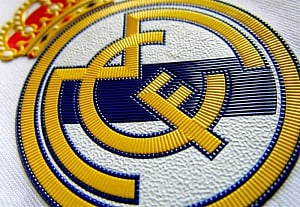 Real Madrid held by Tottenham; Sevilla routed; Man City stay perfect