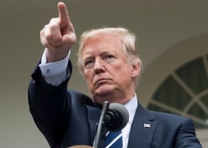 Trump in China, asks it to cut trade ties with N. Korea