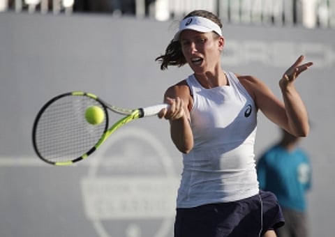 Giant-killer Konta into quarters at San Jose