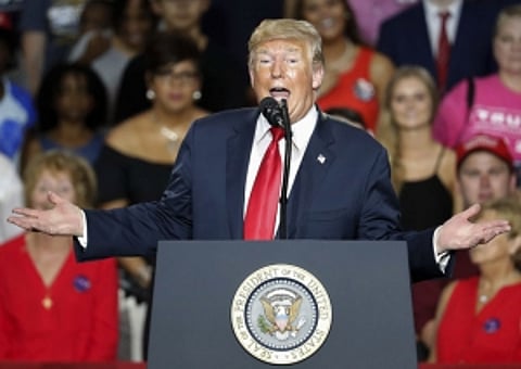 Trump reimposes sanctions on Iran; says open to new nuclear deal