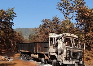 Naxals torch five empty trucks in C'garh