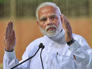 I dream of every family owning a house by 2022: Modi