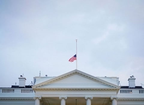 Trump, under pressure to honour McCain, orders flags to half-staff