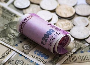 Rupee plunges to yet another record low of 71.10 vs USD