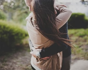 Hugs may protect against conflict-related stress