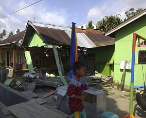 Indonesian city hit by tsunami after strong quake: official
