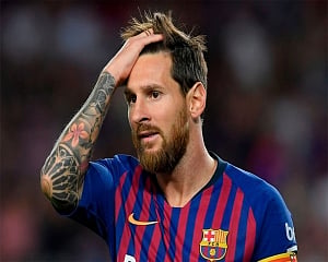 Messi's free-kick magic keeps Barca top