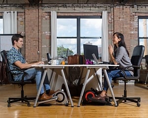 Pedal desks may reduce health risks of sedentary workplace