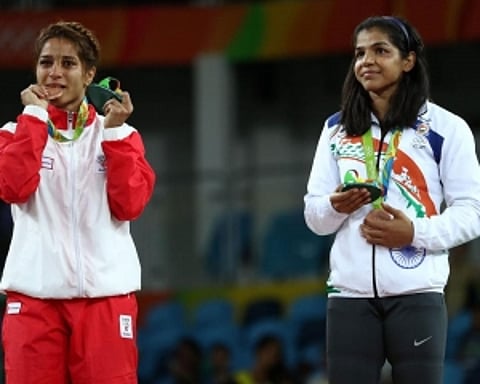 Ritu Malik in bronze contention but crushing defeats for Sakshi, Ritu Phogat