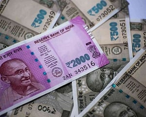 Rupee hits new low of 74.27, plunges 21 paise against USD