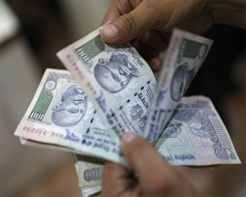 Rupee logs biggest single-day gain in 5 yrs, leaps 100 paise on crude respite