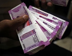 Rupee sinks to new low of 72.91, drops 22 paise against USD